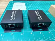 OTK-POE-COX receiver and transmitter, front ports: DC IN, LAN, PLC/LAN/PWR indicators