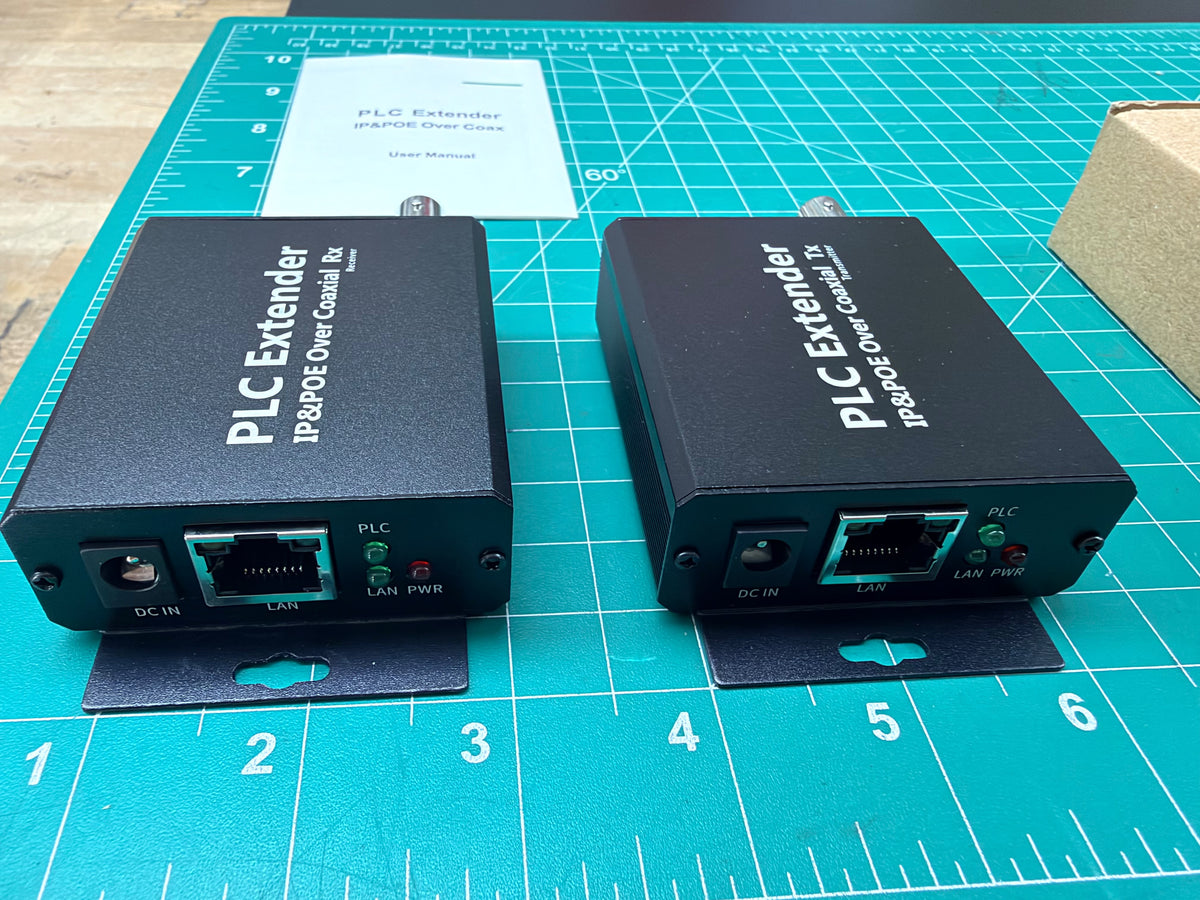 OTK-POE-COX receiver and transmitter, front ports: DC IN, LAN, PLC/LAN/PWR indicators