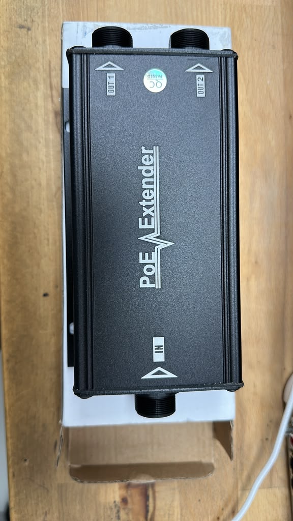 Outdoor PoE Extender top view with IN and OUT 1 / OUT 2 ports